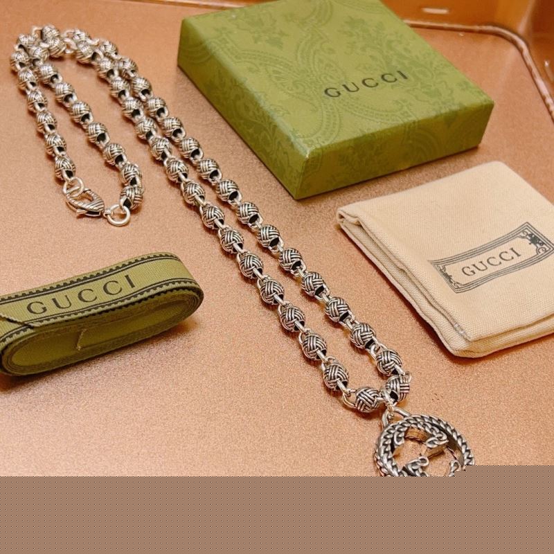 G*u*i necklaces